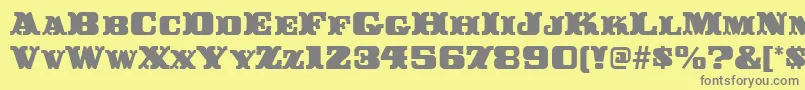 BuckerooitcTt-Schriftart – Graue Schriften auf gelbem Hintergrund