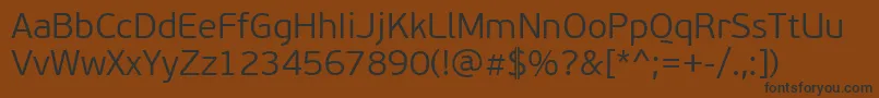 PfbeausansproLight Font – Black Fonts on Brown Background