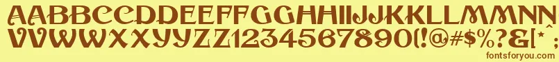 フォントCoalTrainJl – 茶色の文字が黄色の背景にあります。