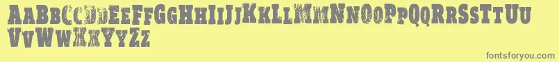 Fonte VtksRealm – fontes cinzas em um fundo amarelo