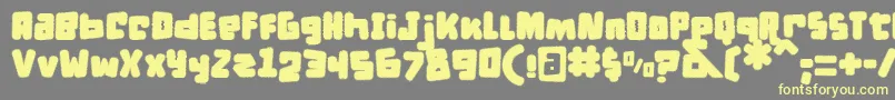 DPuntillasFTiptoesSquid-Schriftart – Gelbe Schriften auf grauem Hintergrund