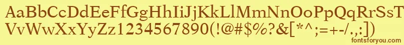 フォントOrchidSsi – 茶色の文字が黄色の背景にあります。