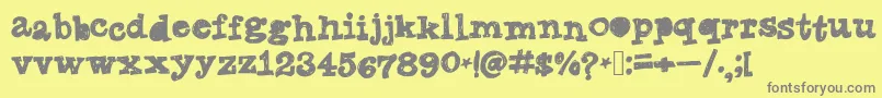 Fonte Tanyasmarkerfont – fontes cinzas em um fundo amarelo