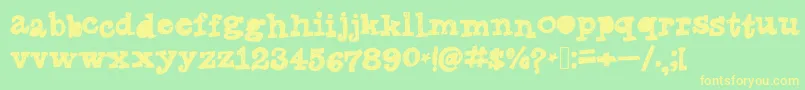 Tanyasmarkerfont Font – Yellow Fonts on Green Background