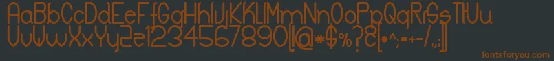 Czcionka KeylaBold – brązowe czcionki na czarnym tle
