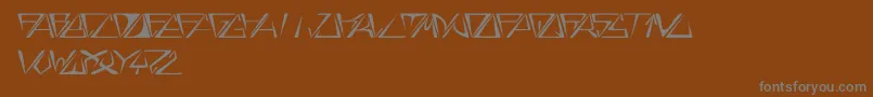 Fonte GloryItalic – fontes cinzas em um fundo marrom