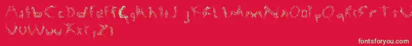 Renisci Font – Green Fonts on Red Background