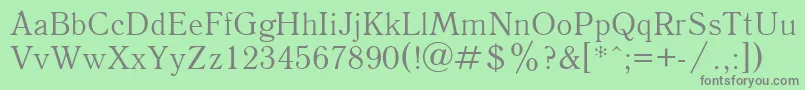 フォントQuantantiquac – 緑の背景に灰色の文字