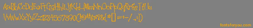 フォントWakiw – オレンジの文字は灰色の背景にあります。