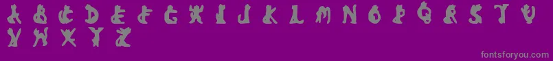 BadBlackCat-fontti – harmaat kirjasimet violetilla taustalla