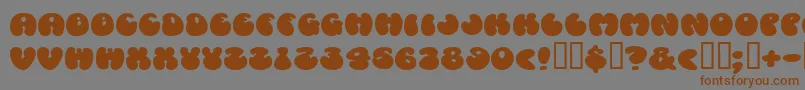 Cosmosca Font – Brown Fonts on Gray Background