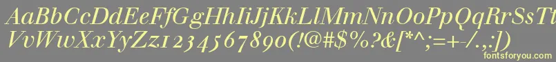 WalbaumItalicOldstyleFigures-fontti – keltaiset fontit harmaalla taustalla