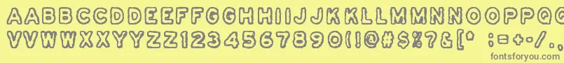Czcionka Osasto329Suljettu – szare czcionki na żółtym tle