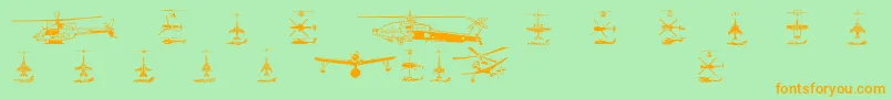 Aircraft1-Schriftart – Orangefarbene Schriften auf grünem Hintergrund