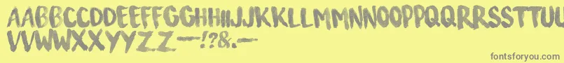 SurfingCapital-Schriftart – Graue Schriften auf gelbem Hintergrund