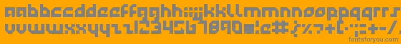 Technotot-Schriftart – Graue Schriften auf orangefarbenem Hintergrund