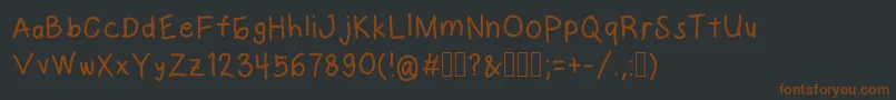 Шрифт CrispyInside – коричневые шрифты на чёрном фоне