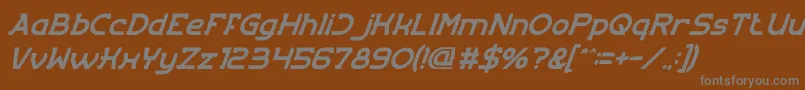 EntranceItalic-fontti – harmaat kirjasimet ruskealla taustalla