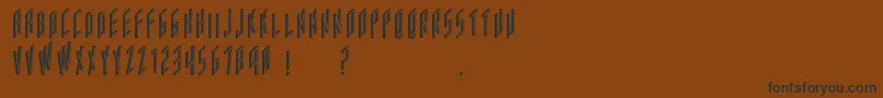 Acframed-Schriftart – Schwarze Schriften auf braunem Hintergrund