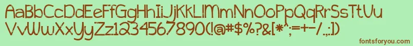 PeytonJenniferDecorated Font – Brown Fonts on Green Background