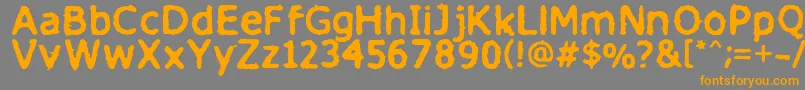フォントFinitimusiungo – オレンジの文字は灰色の背景にあります。