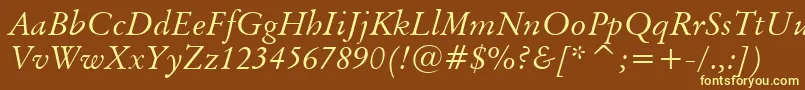 OriginalGaramondItalicBt-fontti – keltaiset fontit ruskealla taustalla