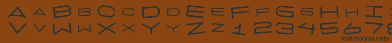 7 Days Rotated Font – Black Fonts on Brown Background