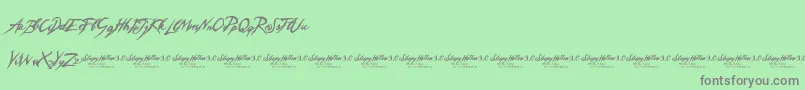 SleepyHollow3.0-Schriftart – Graue Schriften auf grünem Hintergrund