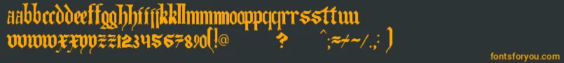 TheArtOfIlluminating-Schriftart – Orangefarbene Schriften auf schwarzem Hintergrund