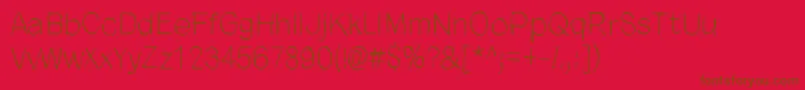 CloseYourEyes-Schriftart – Braune Schriften auf rotem Hintergrund