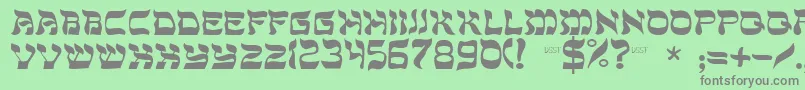 フォントDssholommedium – 緑の背景に灰色の文字