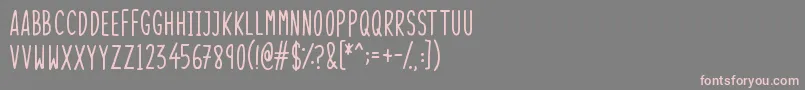 フォントSkinnyThings – 灰色の背景にピンクのフォント