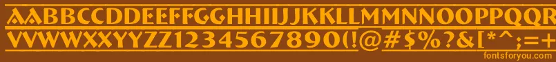 フォントABremendcfr – オレンジ色の文字が茶色の背景にあります。