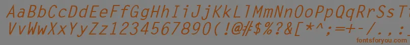 フォントLettergothicBoldItalic – 茶色の文字が灰色の背景にあります。