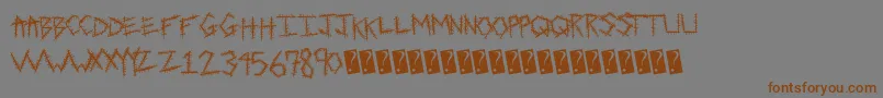 フォントSewntight – 茶色の文字が灰色の背景にあります。