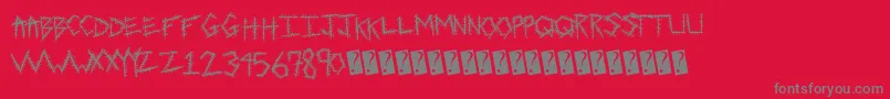 Czcionka Sewntight – szare czcionki na czerwonym tle