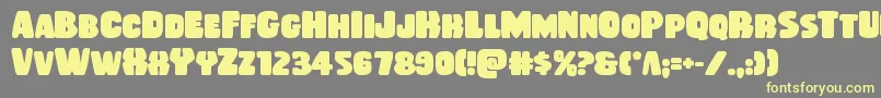 Rubberboybold Font – Yellow Fonts on Gray Background