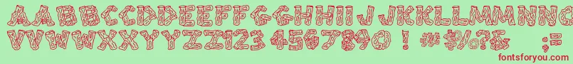 SplintersJl Font – Red Fonts on Green Background