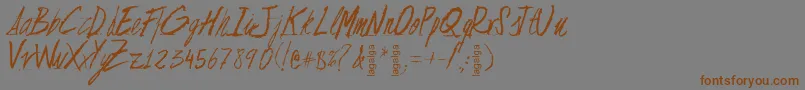 フォントFlojaScript – 茶色の文字が灰色の背景にあります。
