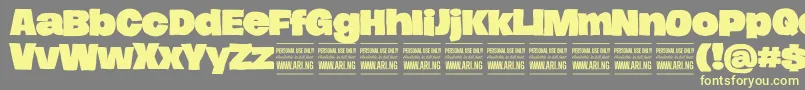 HierografsolidPersonal Font – Yellow Fonts on Gray Background