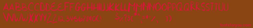 フォントHurriedHand – 赤い文字が茶色の背景にあります。