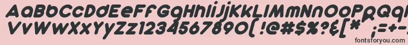 DunkinSansItalic-fontti – mustat fontit vaaleanpunaisella taustalla