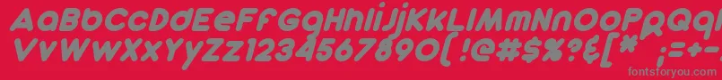 DunkinSansItalic-Schriftart – Graue Schriften auf rotem Hintergrund