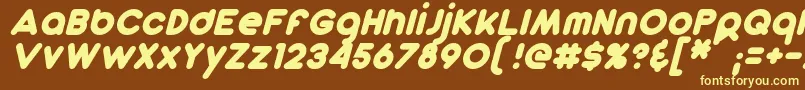 DunkinSansItalic-fontti – keltaiset fontit ruskealla taustalla