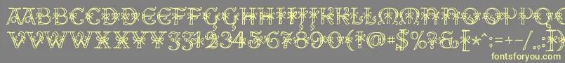 AlesHegarR18-fontti – keltaiset fontit harmaalla taustalla