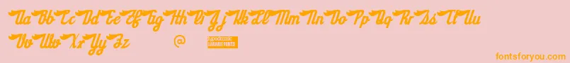 Sloegin-Schriftart – Orangefarbene Schriften auf rosa Hintergrund