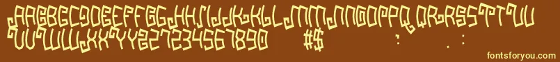Mayapan-fontti – keltaiset fontit ruskealla taustalla