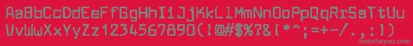 フォントLarabiefontink – 赤い背景に灰色の文字