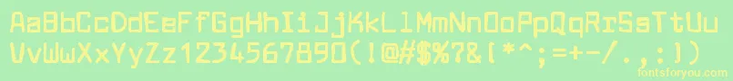 フォントLarabiefontink – 黄色の文字が緑の背景にあります
