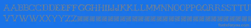Wickers-fontti – harmaat kirjasimet sinisellä taustalla